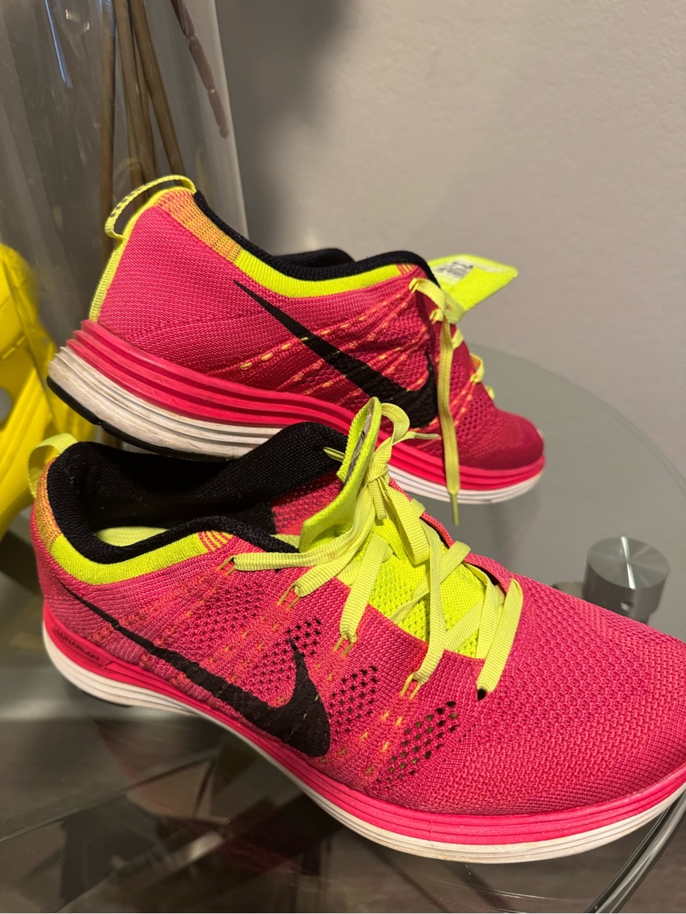 Nike Women’s Hot Pink & Neon Yellow Flyknit Running Sneakers